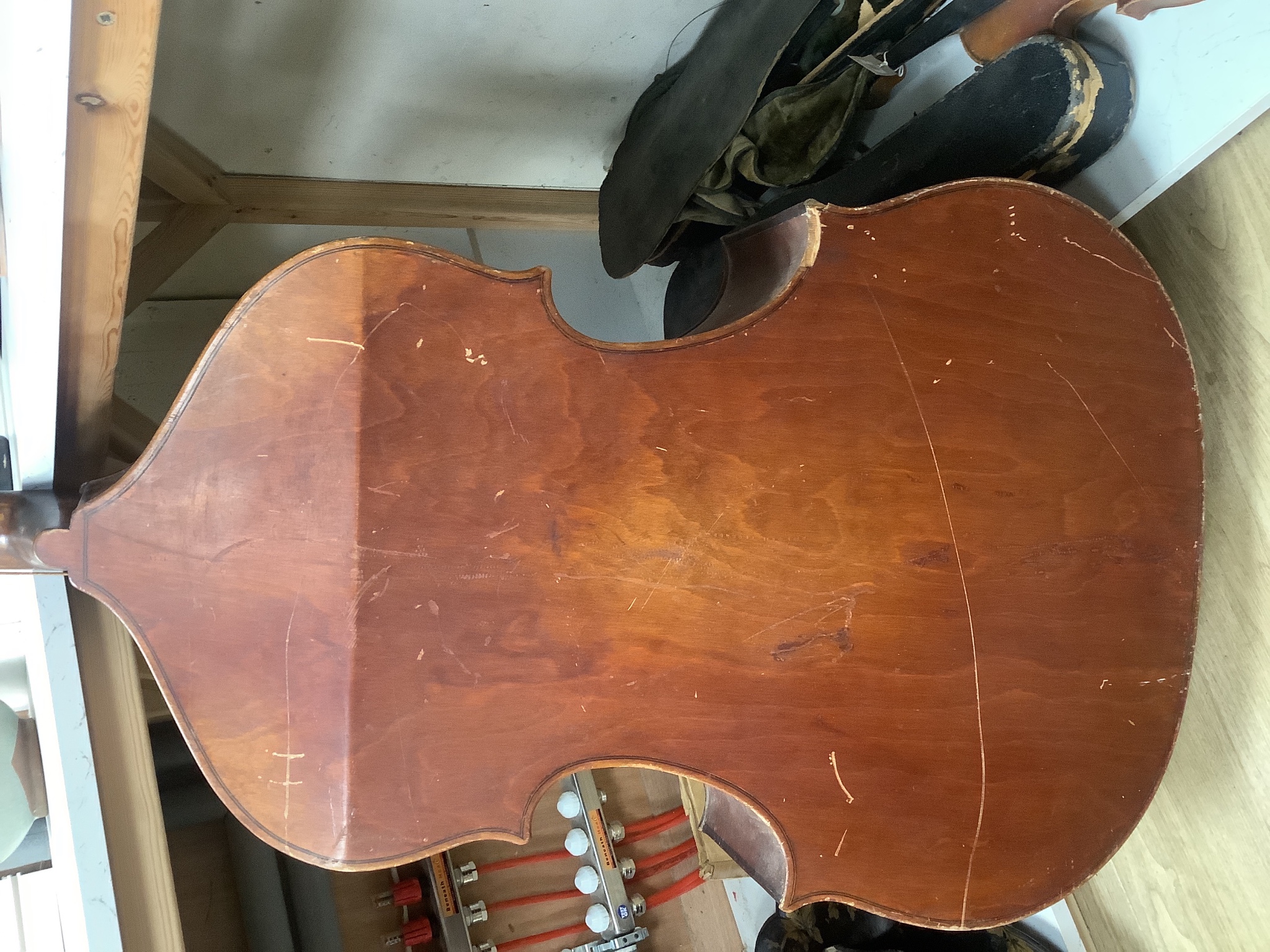 A double bass and three various violins, double bass 165cms high